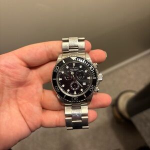 Silver and Black Invicta Chronograph Watch